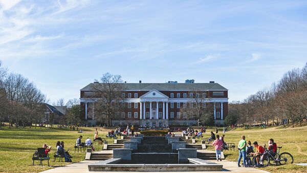 Students outdoors on the Mall on an unseasonably warm February day.